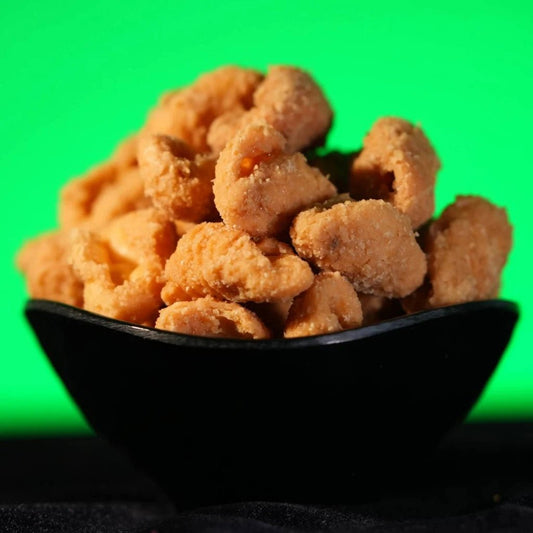 Gavvalu β traditional Andhra sweet shells made from flour and jaggery, deep-fried to a golden crisp and coated with syrup for a crunchy, caramelized bite from Estaa Sweets, Bangalore