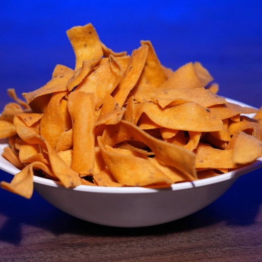 Ribbon Pakoda from Estaa Sweets Bangalore β crispy South Indian snack made with rice flour, besan, and spices, deep-fried in pure oil with no palm oil, perfect for festive and everyday snacking