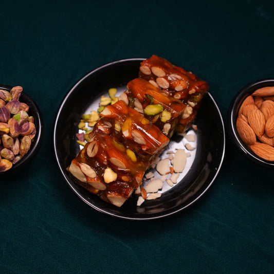 Traditional Bombay Halwa with a shiny jelly-like texture with Badam and Pista