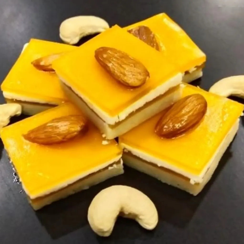 Kaju Mango Chocolate from Estaa Sweets Bangalore – fusion sweet made with cashew base, mango jelly, and white chocolate, a rich and unique festive treat